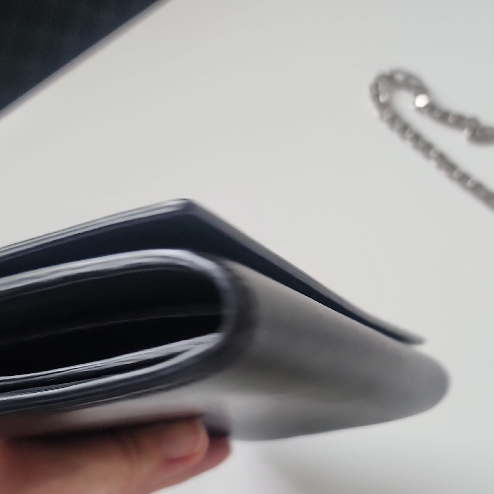 Yves Saint Laurent Black Clutch with Silver Logo - Picture 6 of 10